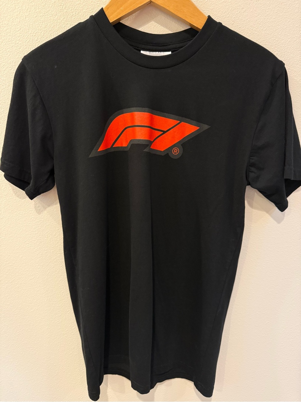 Men's Black Short-Sleeve Tee with Red Logo Accent
